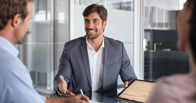 What is outsourced accounting? Meeting with CPA shaking hands